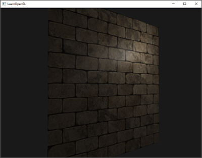 Brick surface lighted by point light in OpenGL. It's not too realistic; its flat structures is now quite obvious