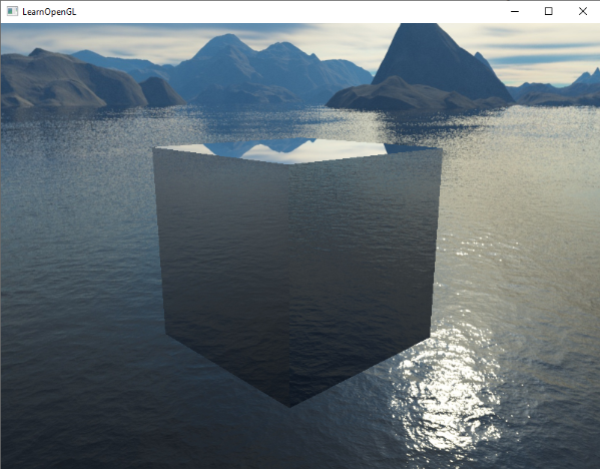 Image of a cube reflecting a skybox via cubemaps via environment mapping.